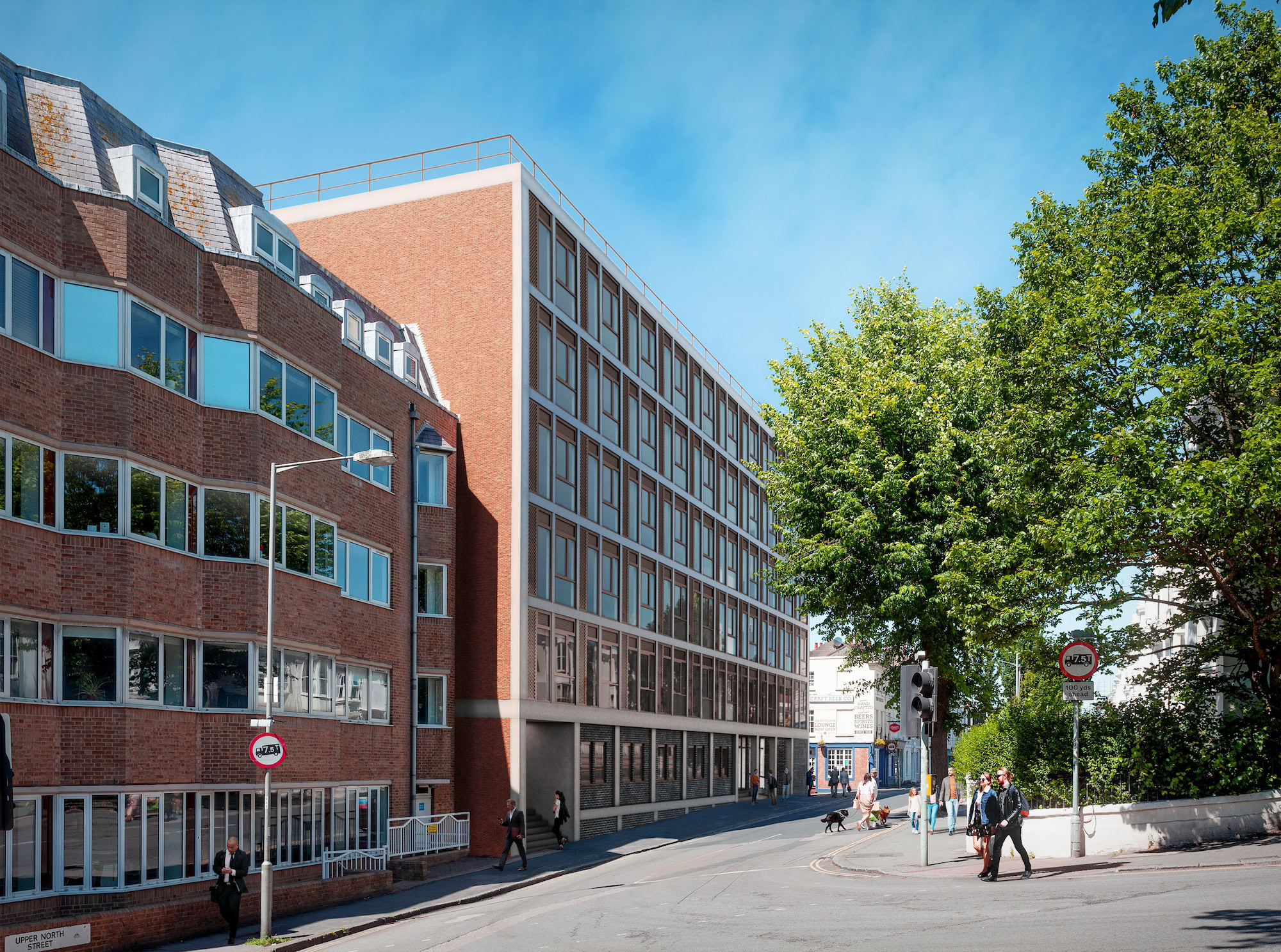A street scene featuring a red-brick building with people walking by, trees lining the sidewalk, and a blue sky with clouds above. This creates a bright and bustling atmosphere.