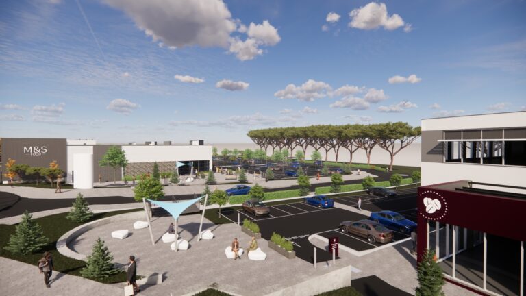A parking lot filled with people, surrounded by trees under a cloudy sky.