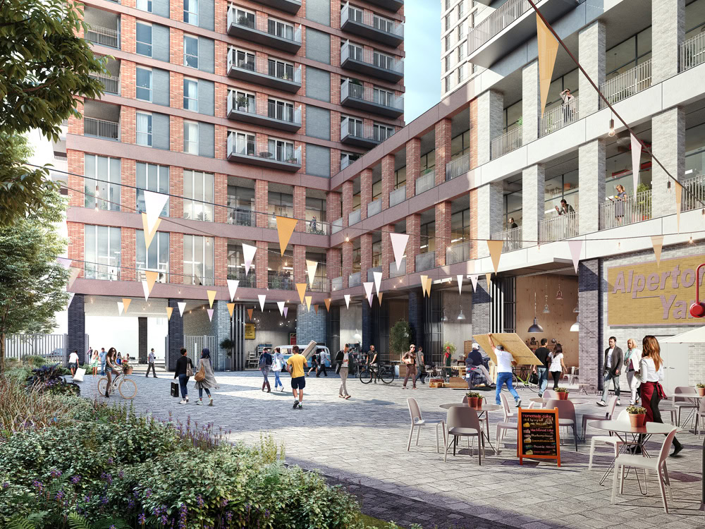A square with modern buildings and balconies, filled with people eating, walking and cycling around.