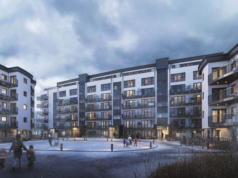 An apartment block in winter with snow falling. People are wrapped in coats walking around along with children playing in the courtyard.