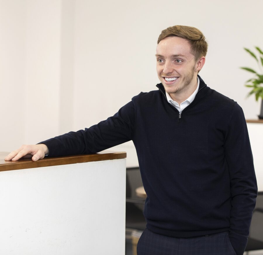 Man in corporate wear smiling