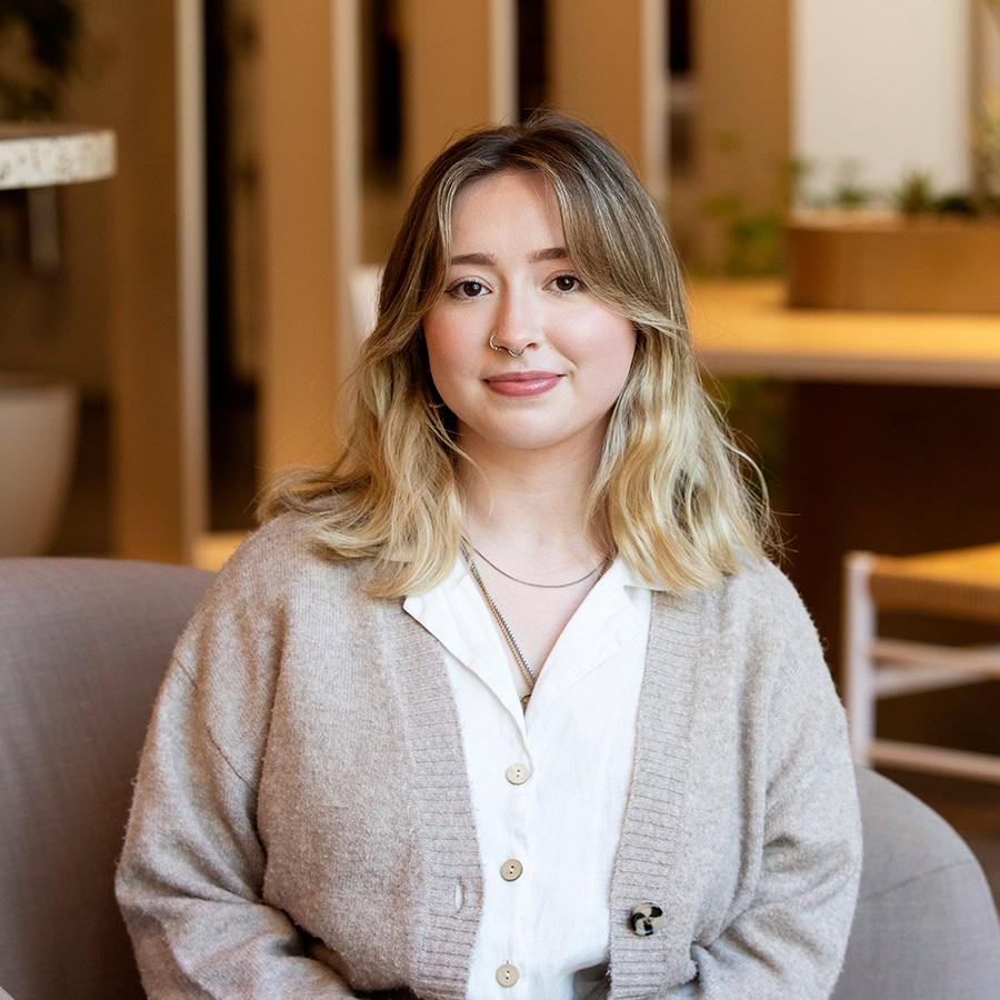 Taylor Weatherley headshot inside the office