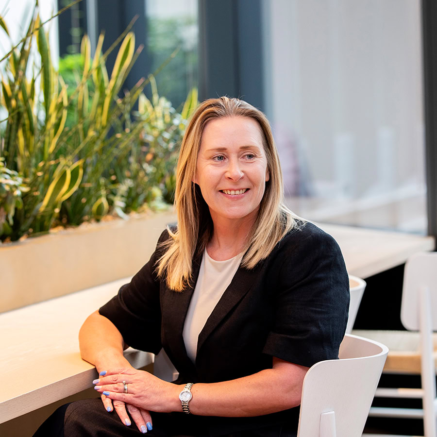 sarah goodey headshot inside the office